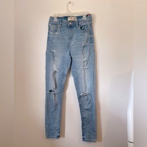 Garage light wash high rise distressed skinny jeans
